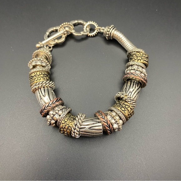 Intricate Silver and Gold Tribal-Inspired Bracelet - Picture 1 of 6